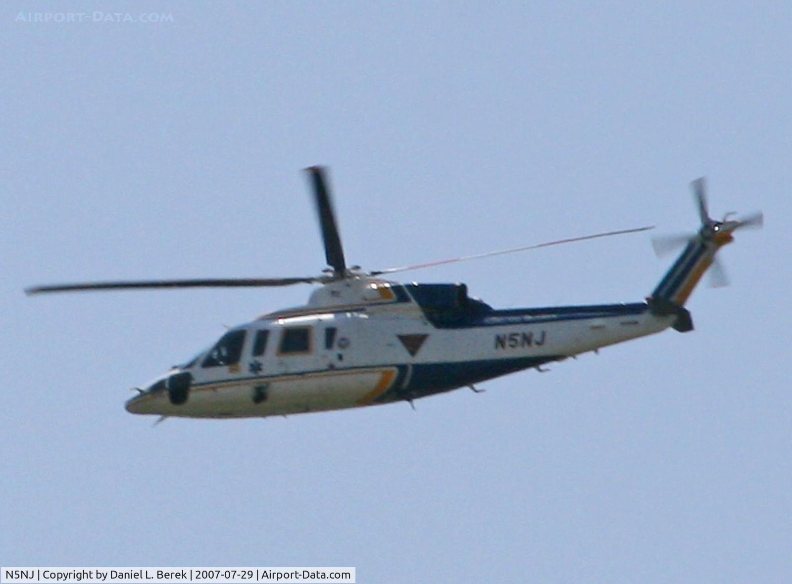 N5NJ, 1988 Sikorsky S-76B C/N 760346, NJ State Police survey the annual State Fair.