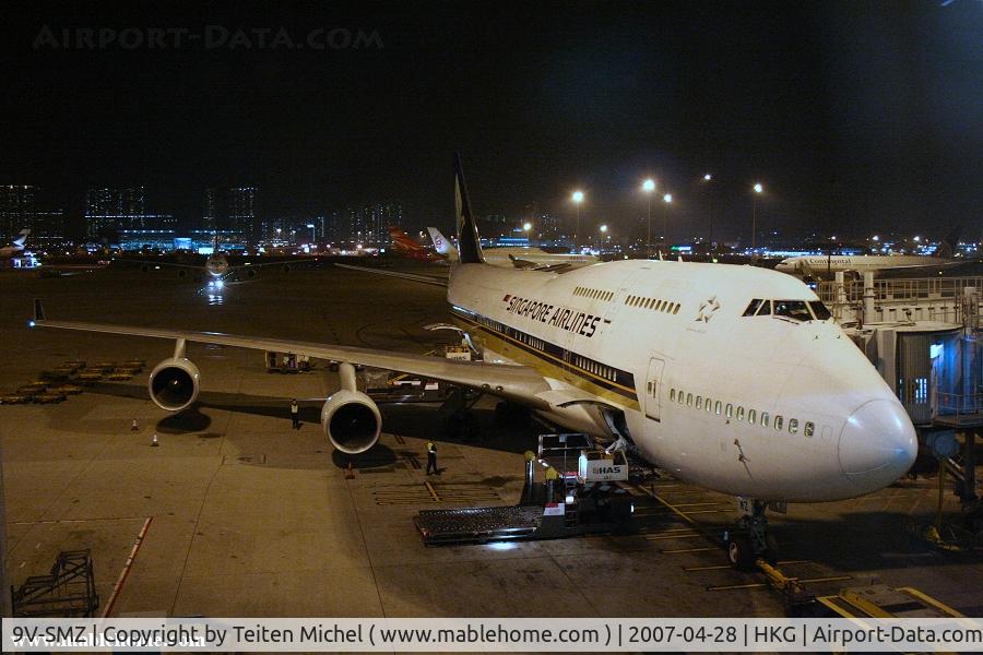 9V-SMZ, 1994 Boeing 747-412 C/N 26549, 9V-SMZ at the Hong-Kong International Airport late in the night ...