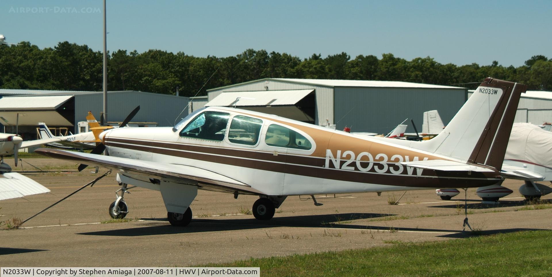 N2033W, 1965 Beech 35-C33 Debonair C/N CD-979, On the ramp at Brookhaven...
