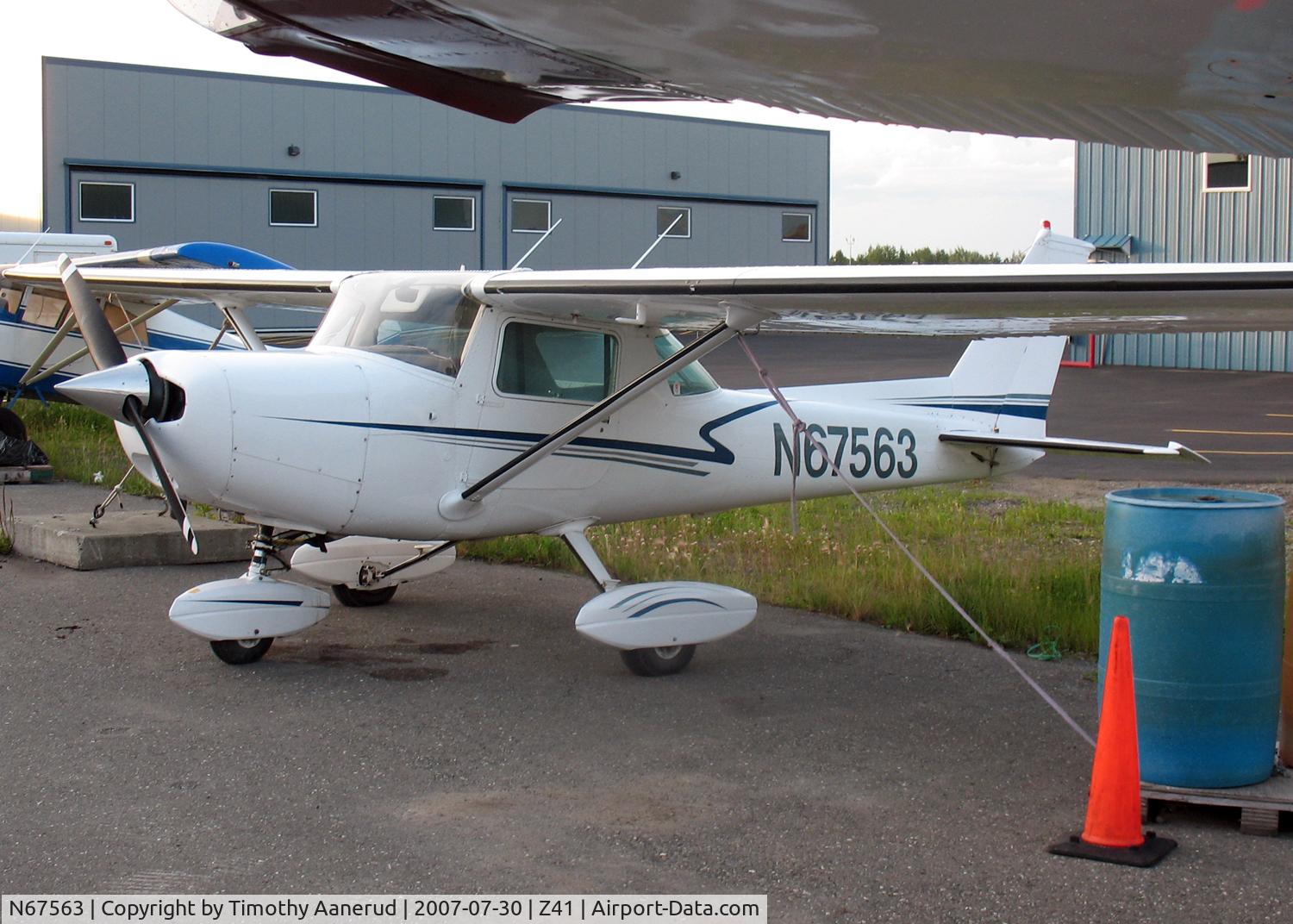 N67563, 1978 Cessna 152 C/N 15281913, Parked near Lake Hood. N7813A's wing is in the way...
