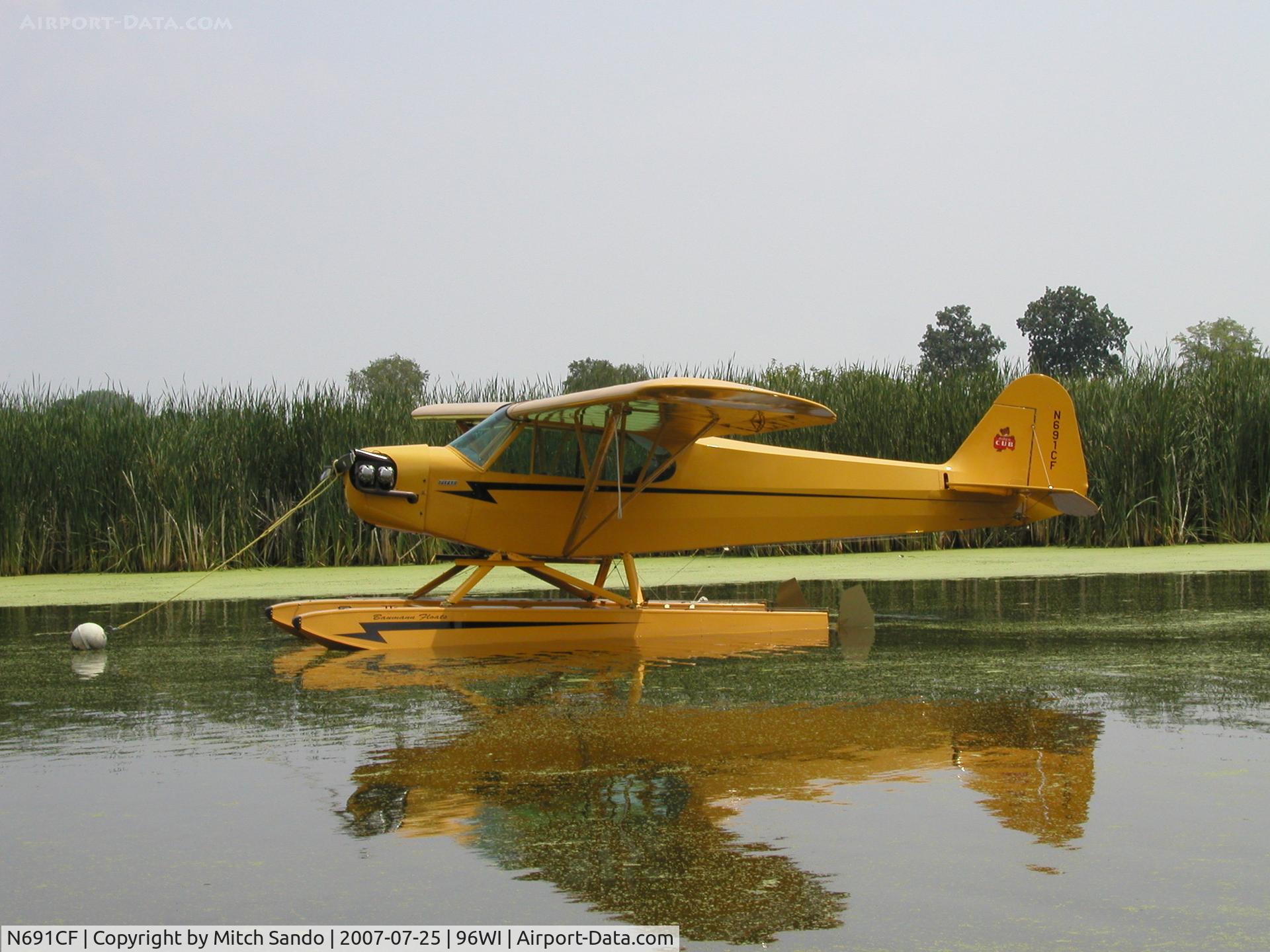 N691CF, 1946 Piper J3C-65 Cub C/N 16160, EAA AirVenture 2007.