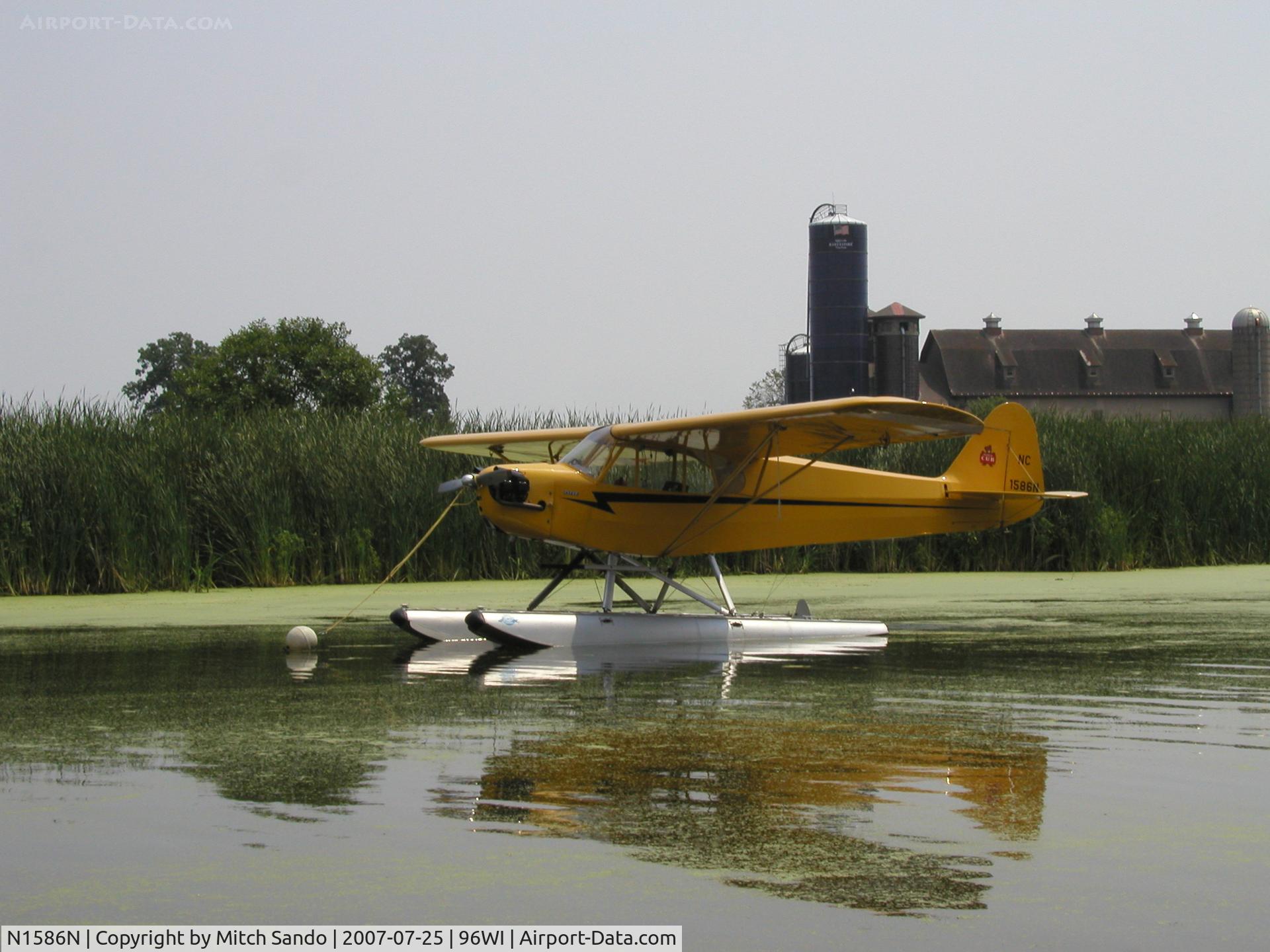 N1586N, 1947 Piper J3C-65 Cub Cub C/N 23118, EAA AirVenture 2007.