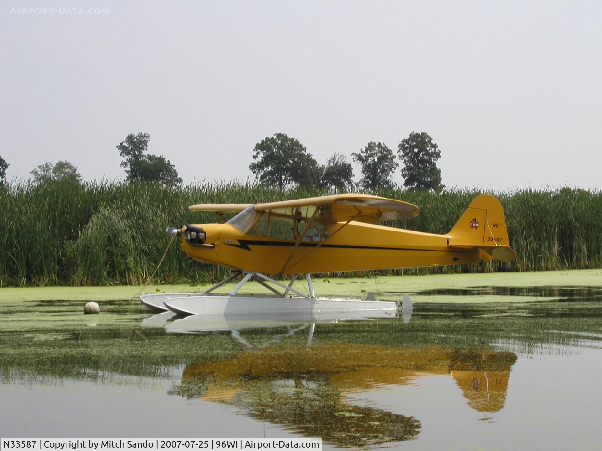 N33587, 1945 Piper J3C-65 Cub Cub C/N 14064, EAA AirVenture 2007.