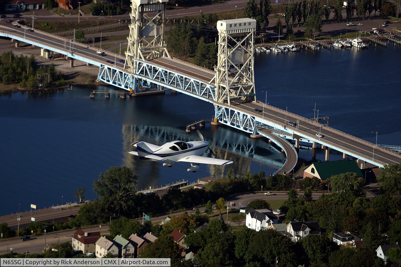 N65SG, 1988 Stoddard-Hamilton Glasair SH-2F C/N 110, A glassair flying extremely close the to Portage lift bridge!