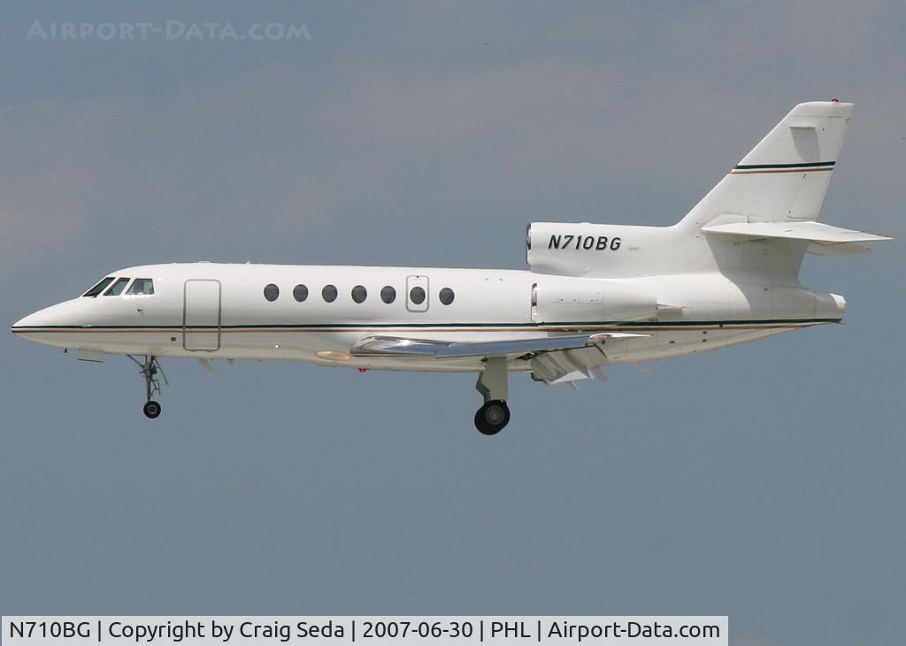 N710BG, 2001 Dassault Falcon 50EX C/N 305, Just about to touch down on rw 27R.