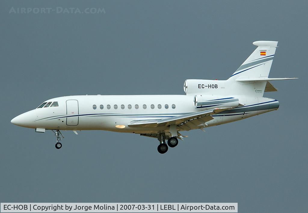 EC-HOB, 1999 Dassault Falcon 900EX C/N 43, Clear to land RWY 25R with storm clouds...