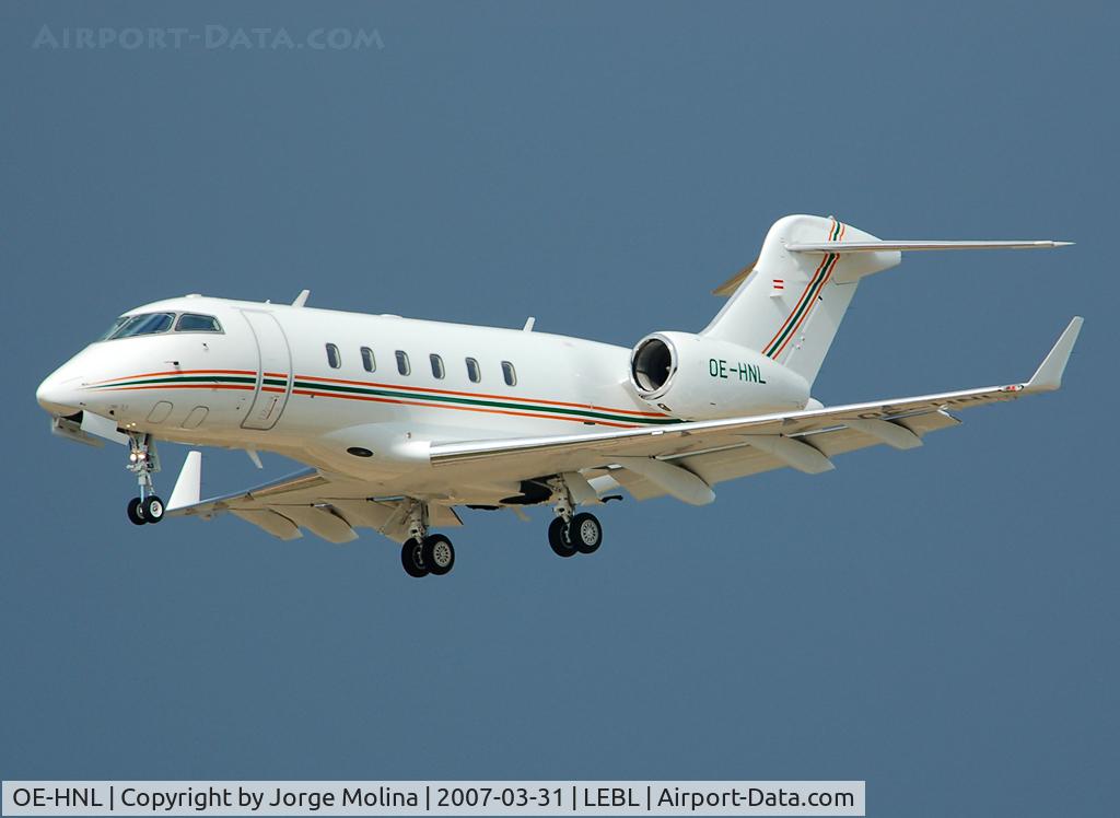OE-HNL, 2005 Bombardier Challenger 300 (BD-100-1A10) C/N 20039, Short final RWY 25R with great contrast of storm clouds behind.