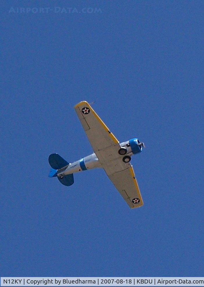 N12KY, 1943 North American SNJ-5 Texan Texan C/N 90995, The Spirit of '44 flys over the field at Boulder Open House.
