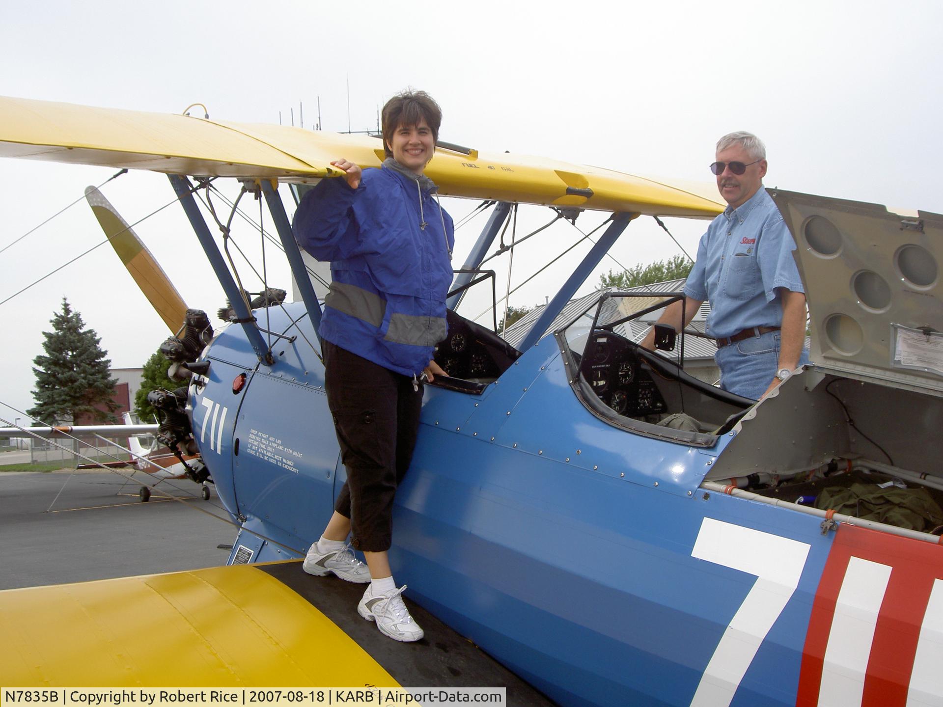 N7835B, Boeing A75N1(PT17) C/N 75-4587, Jennifer Rice about to take a ride with Chris Dackson at Great Commission Air open house Fundraiser