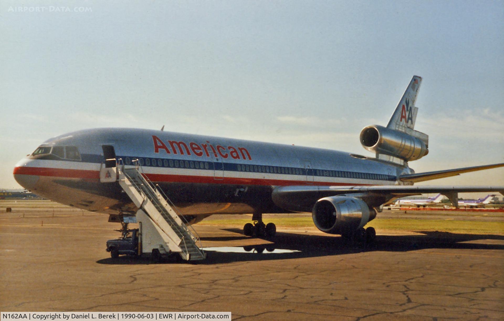 N162AA, 1974 McDonnell Douglas DC-10-10 C/N 46943, Beautifully shiny DC-10-10 (delivered in 1974 to National) shows off her lines in this June 1990 view at EWR.