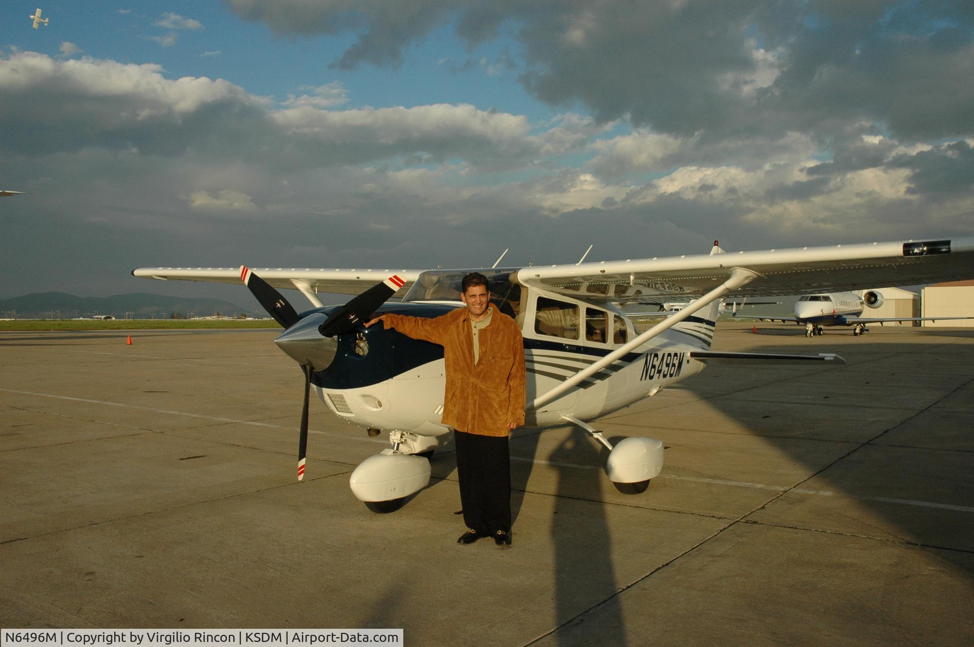 N6496M, 2004 Cessna T206H Turbo Stationair C/N T20608479, Pre-fly inspection at Brown Field in san Diego, California. See the sky.