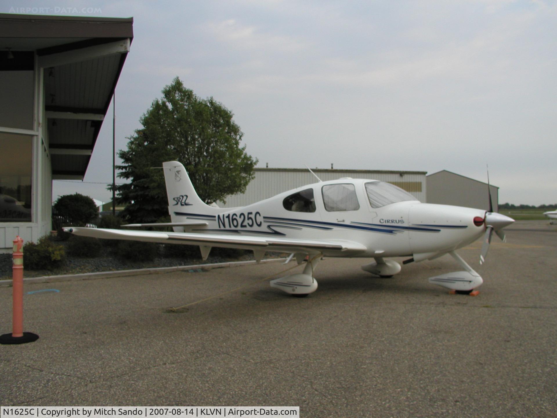N1625C, 2003 Cirrus SR22 C/N 0584, Parked on the ramp at Airlake after a flight from Romeoville, IL (LOT).