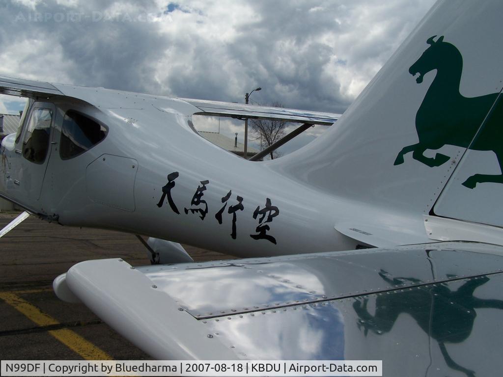 N99DF, 1999 Stoddard-Hamilton Glastar GS-1 C/N 5221, Parked for Display at Boulder open house. the chinese characters on the side of the fuselage that translates to 