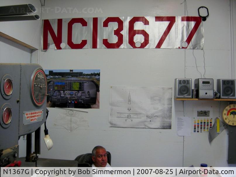 N1367G, Rose Parrakeet A-1 C/N 101, I wonder if Carl knows that he's sitting right under a section of fabric from THE original certified Parakeet A1 (1934) in Ed Fisher's shop.  Registration changed from X13677 to NX13677, NC13677, NC1367G, to N1367G