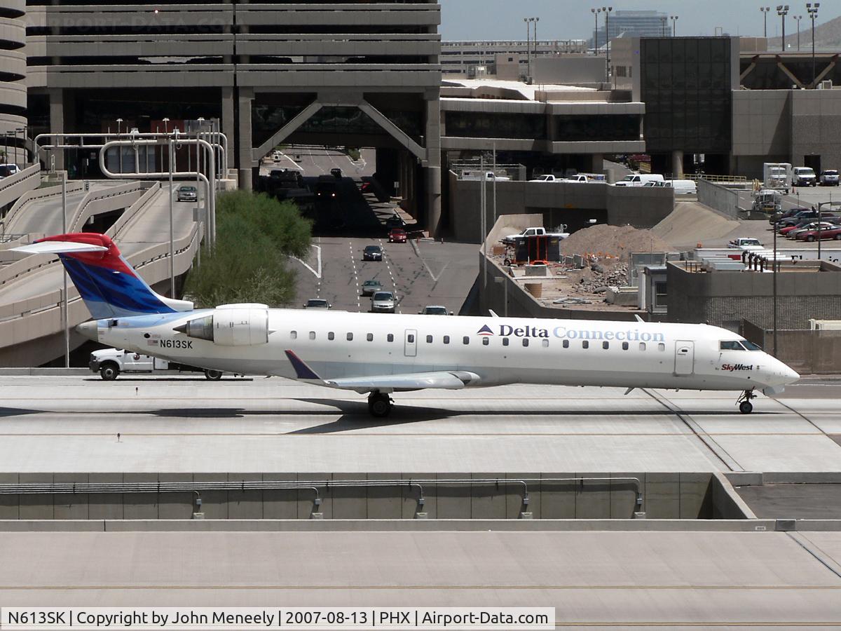 N613SK, 2002 Bombardier CRJ-701 (CL-600-2C10) Regional Jet C/N 10038, Taxiing for 25R