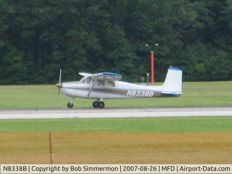 N8338B, 1957 Cessna 172 C/N 36138, Landing on 32 at Mansfield, OH during EAA MERFI event.