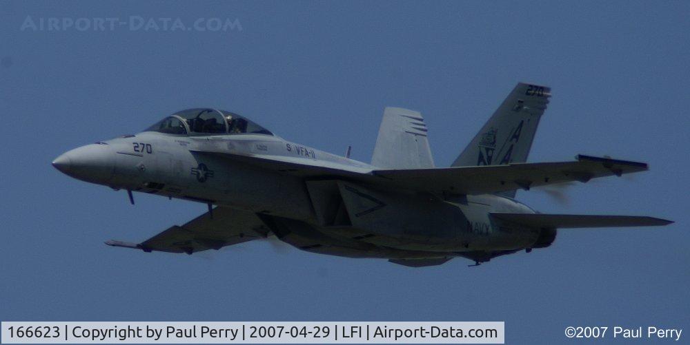166623, Boeing F/A-18F Super Hornet C/N F116, High speed pass, and vapor is forming on the wing protuberances