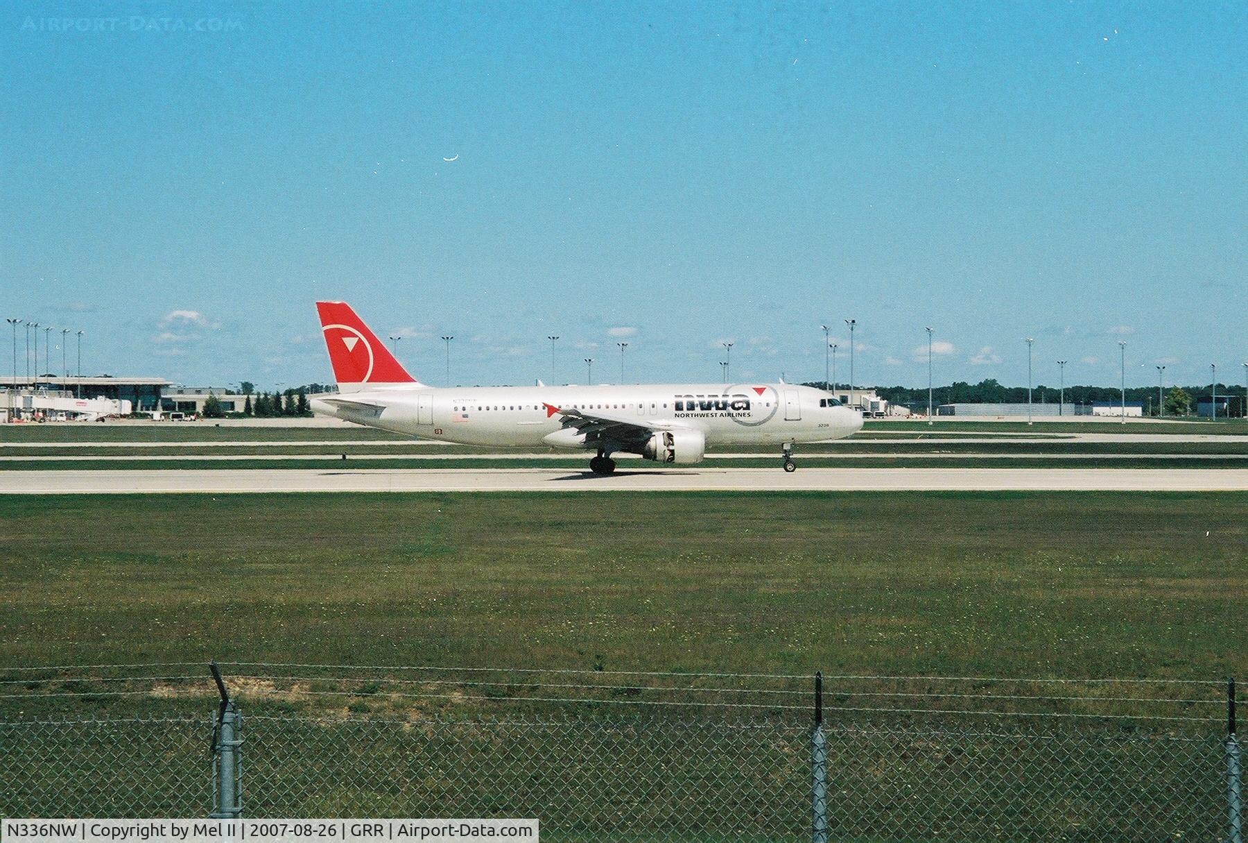 N336NW, 1992 Airbus A320-212 C/N 355, NWA1135 from DTW landing on RWY 8R @ Gerald R. Ford International Airport (GRR)