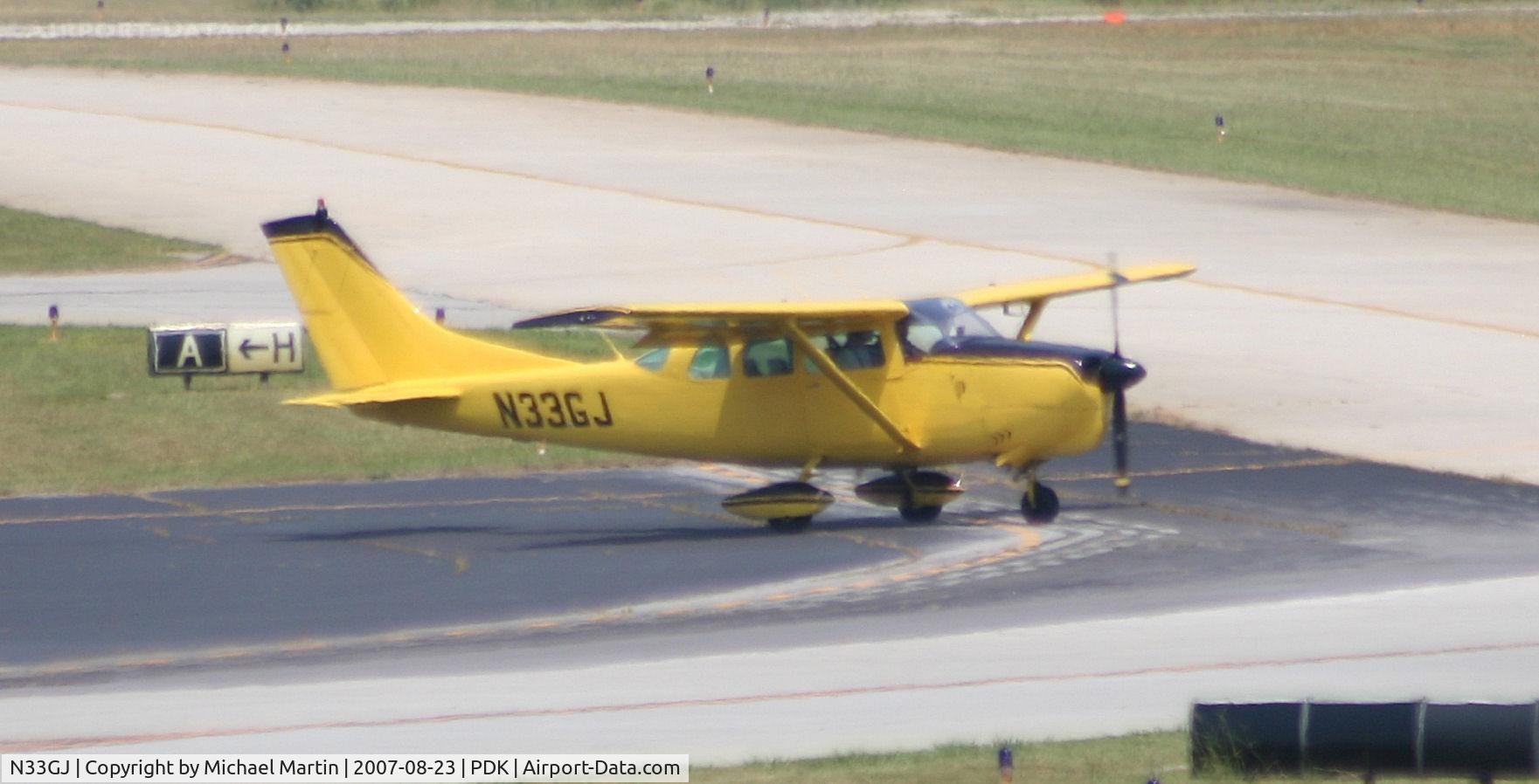 N33GJ, 1964 Cessna 210-5A(205A) C/N 205-0538, In Run-Up Area.
