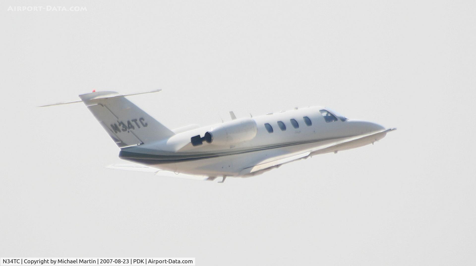 N34TC, 1994 Cessna 525 CitationJet C/N 5250083, Departing PDK enroute to 0A9