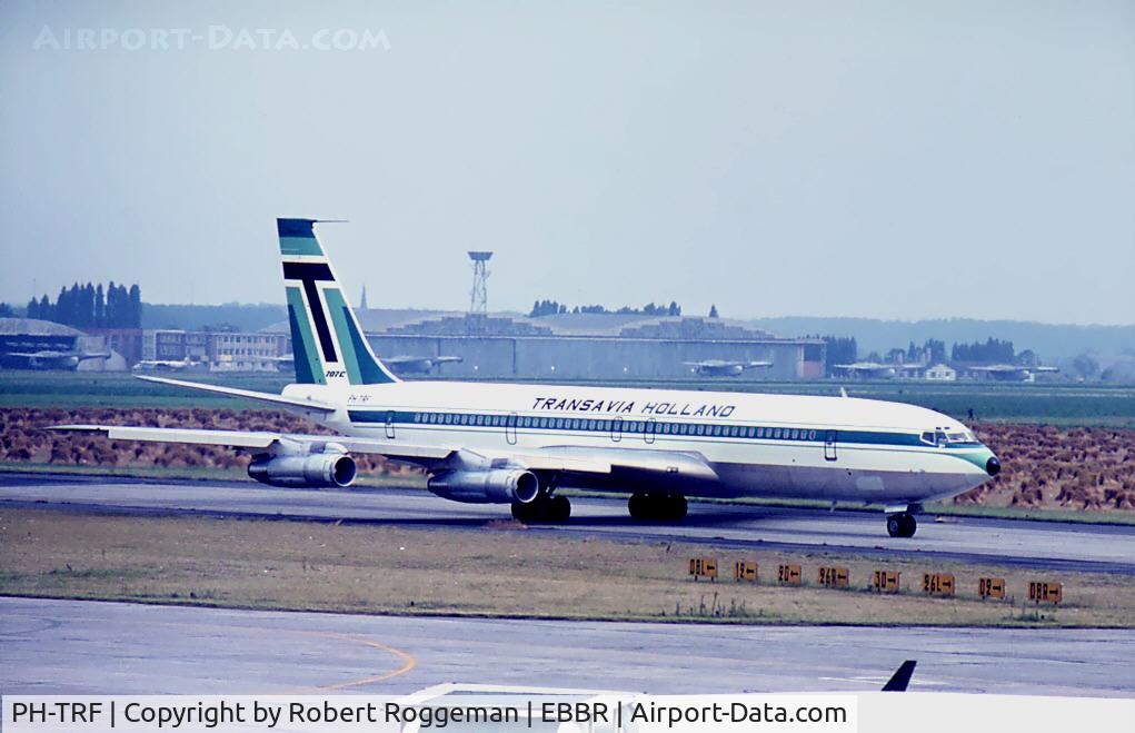 PH-TRF, 1967 Boeing 707-355C C/N 19664, TRANSAVIA HOLLAND.In the background C-119G's BAF 15 Wing.Late 1960's.