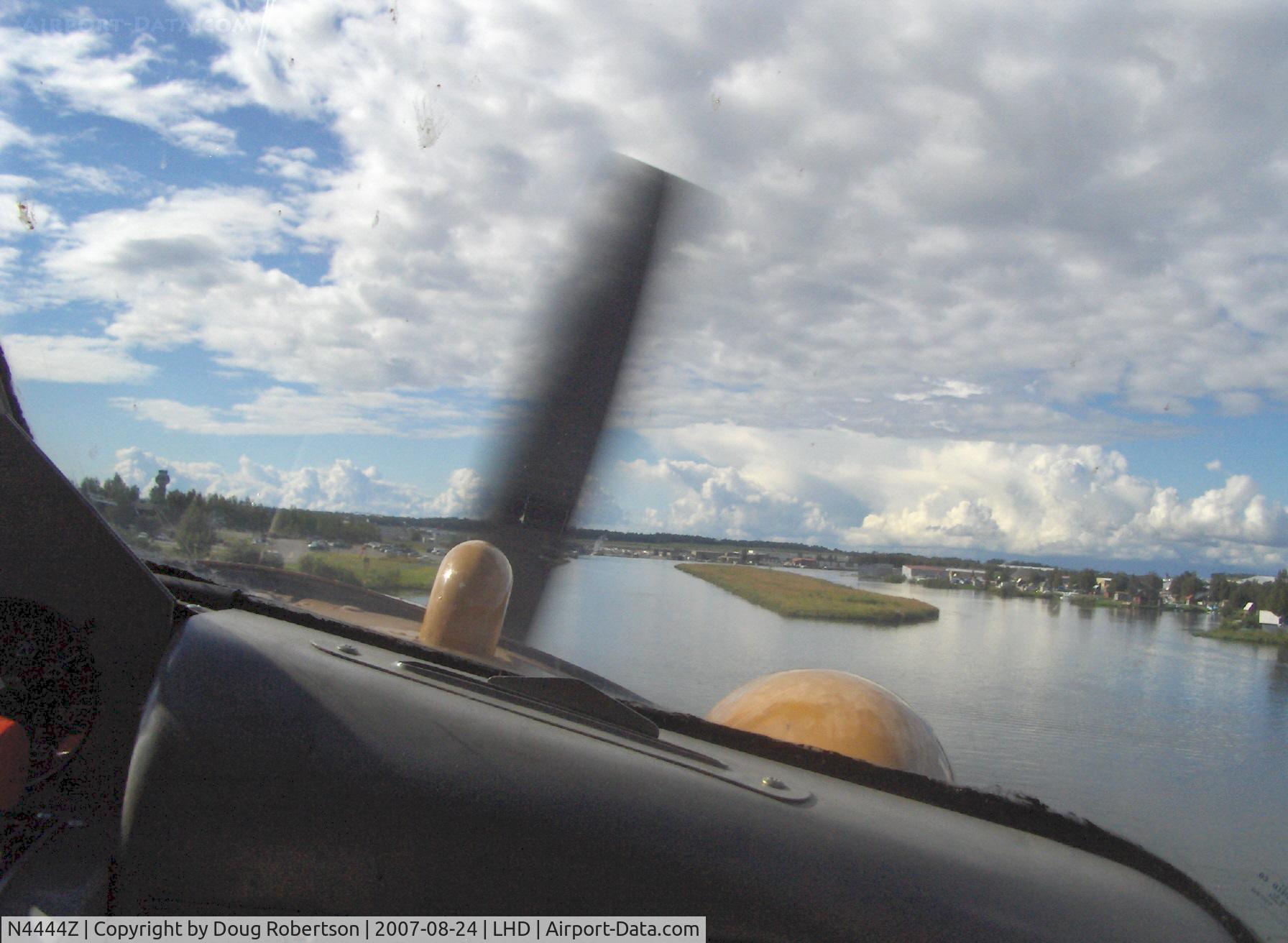 N4444Z, 1958 De Havilland Canada Beaver DHC-2 Mk1 C/N 1307, 1958 DeHavilland BEAVER DHC-2 MK.1, P&W R-985 Wasp Jr. 450 Hp, descent on final for landing left water lane, chartered flight. Note: ANC tower-left horizon.