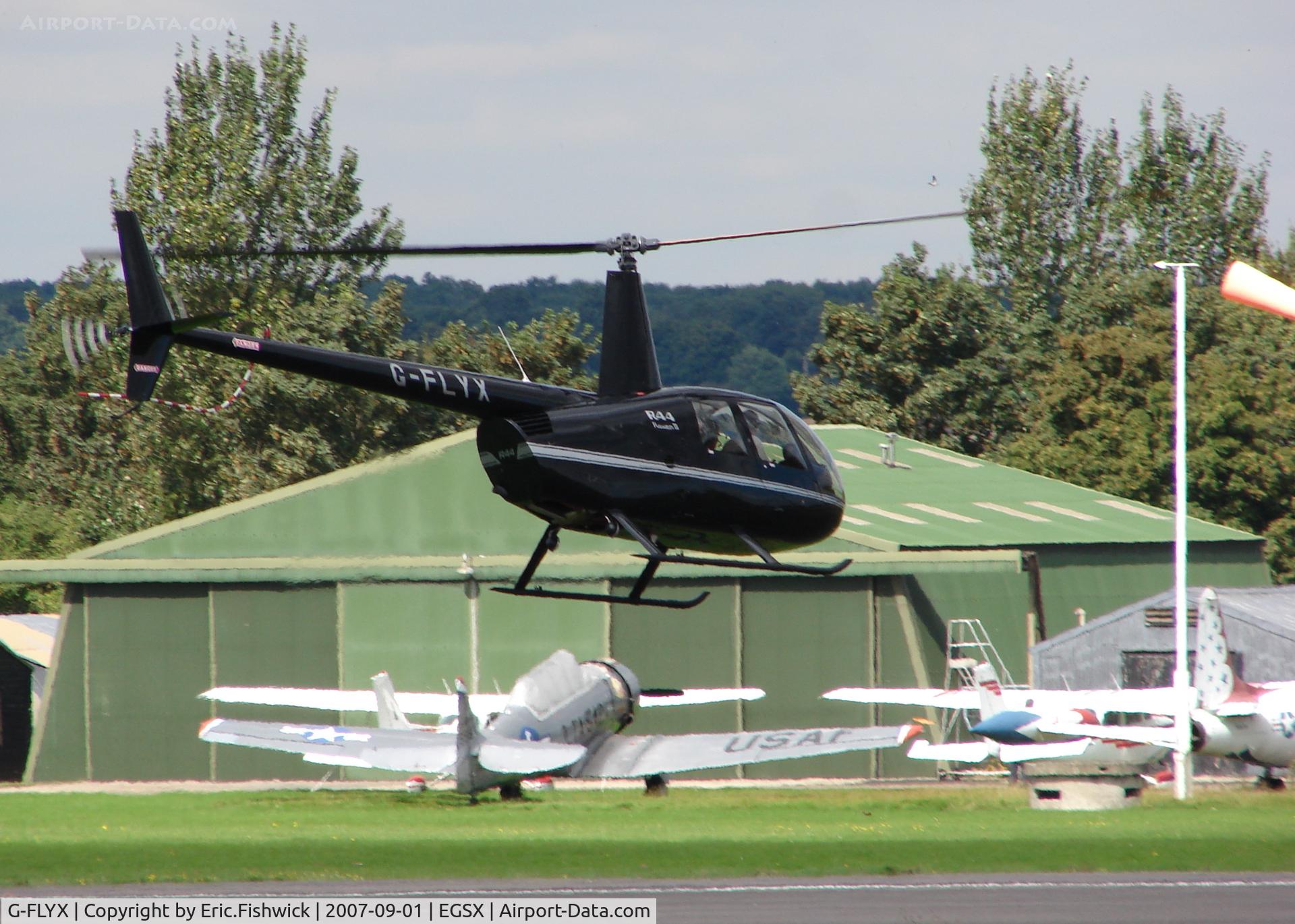 G-FLYX, 2007 Robinson R44 Raven II C/N 11669, 2. G-FLYX at North Weald