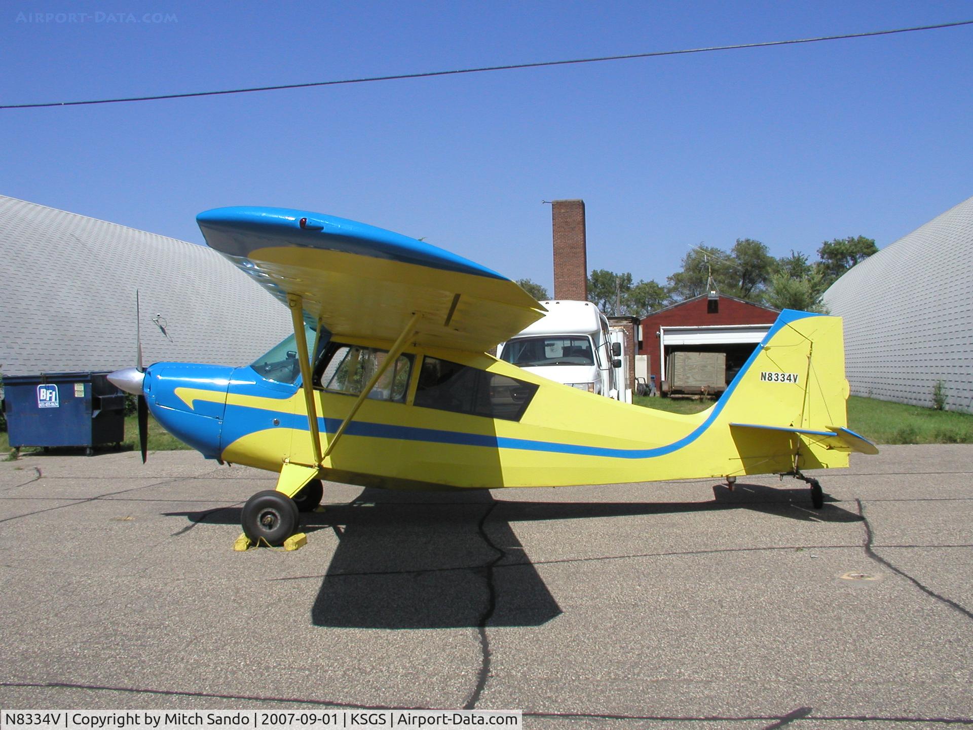 N8334V, 1966 Champion 7ECA Citabria C/N 482, Parked on the ramp at Fleming Field.