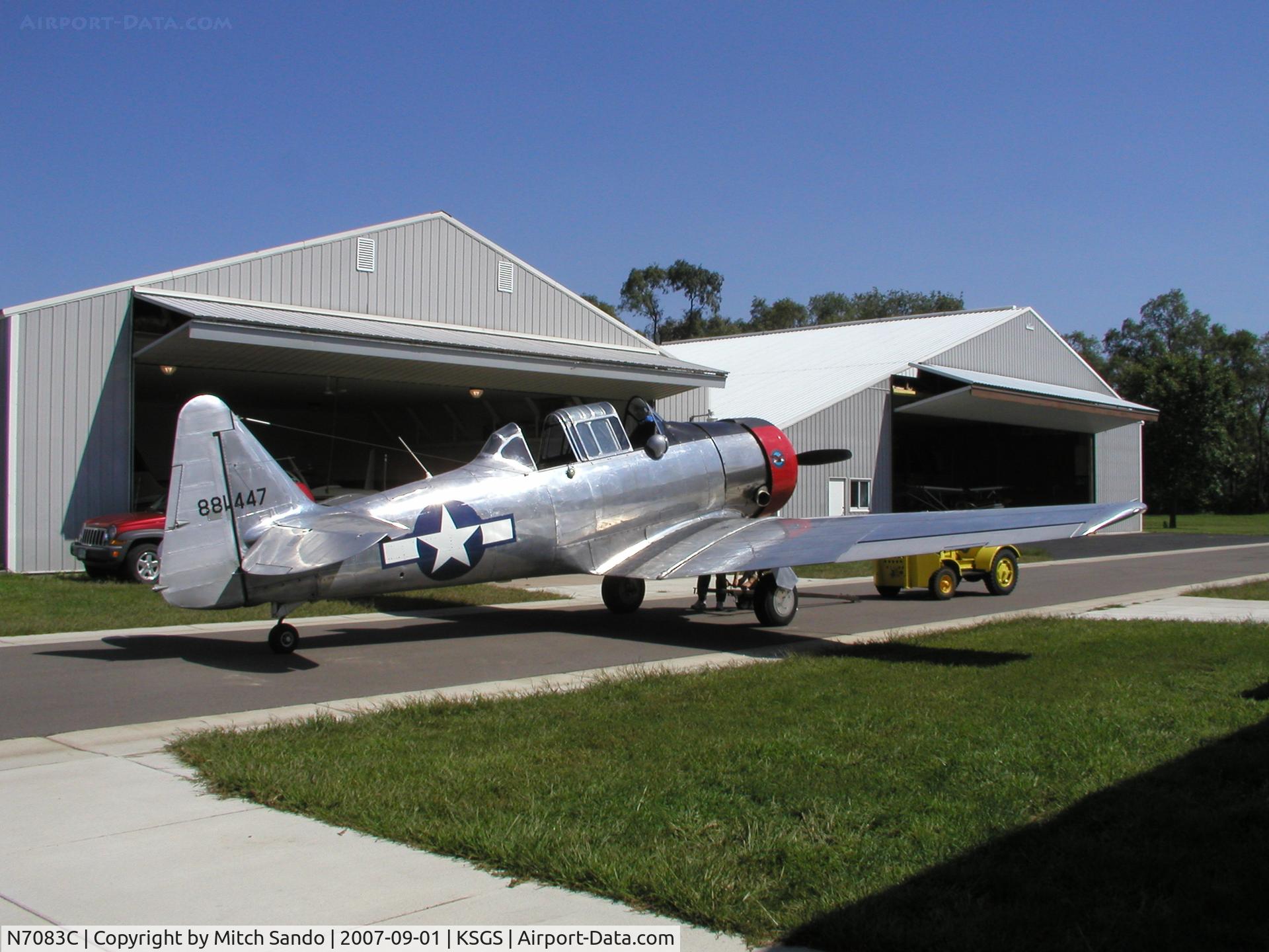 N7083C, 1943 North American SNJ-4 Texan C/N 88-14047, T-6 Parked outside it's hangar.