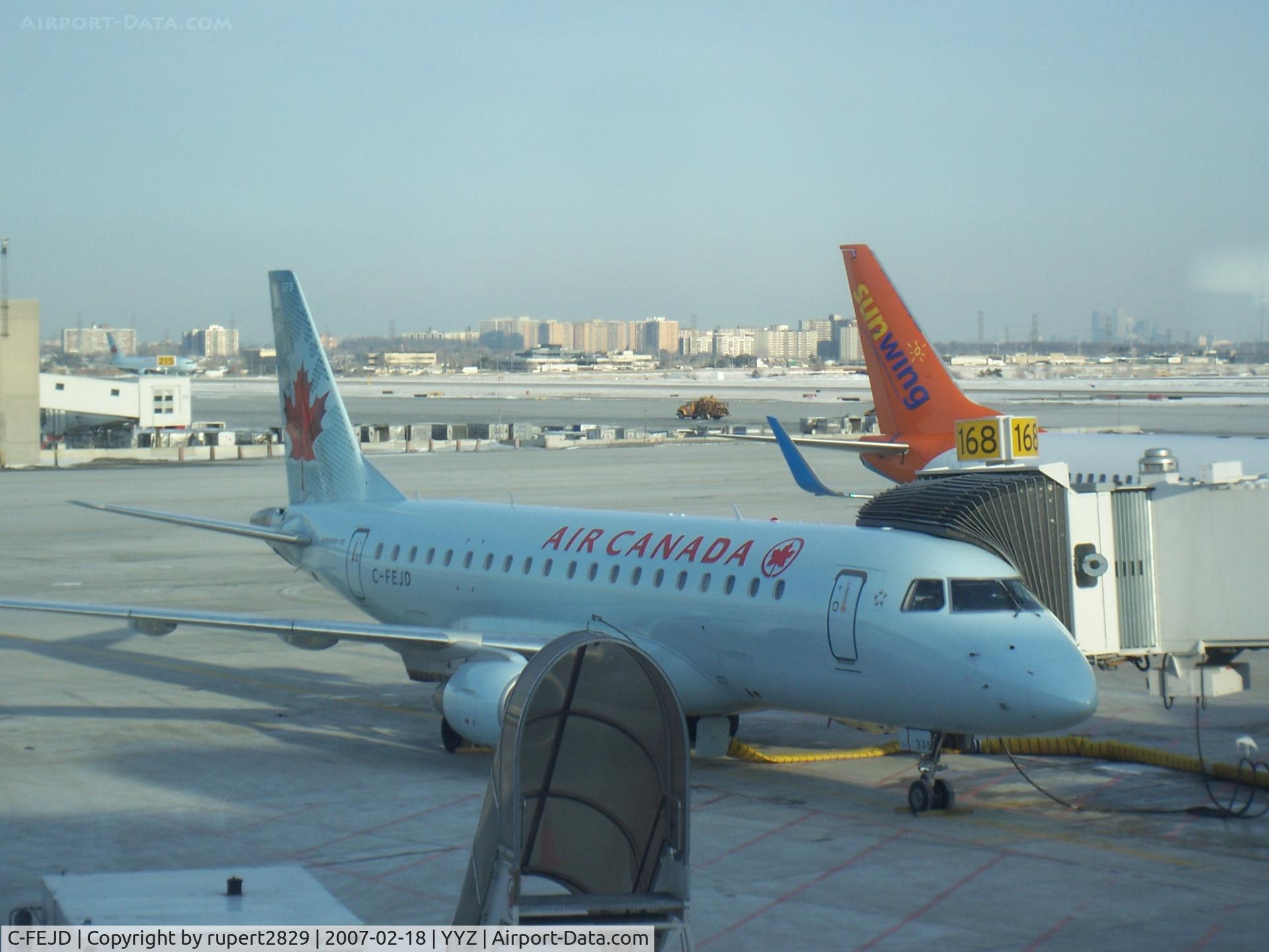 C-FEJD, 2005 Embraer 175SU (ERJ-170-200SU) C/N 17000090, At gate in Toronto