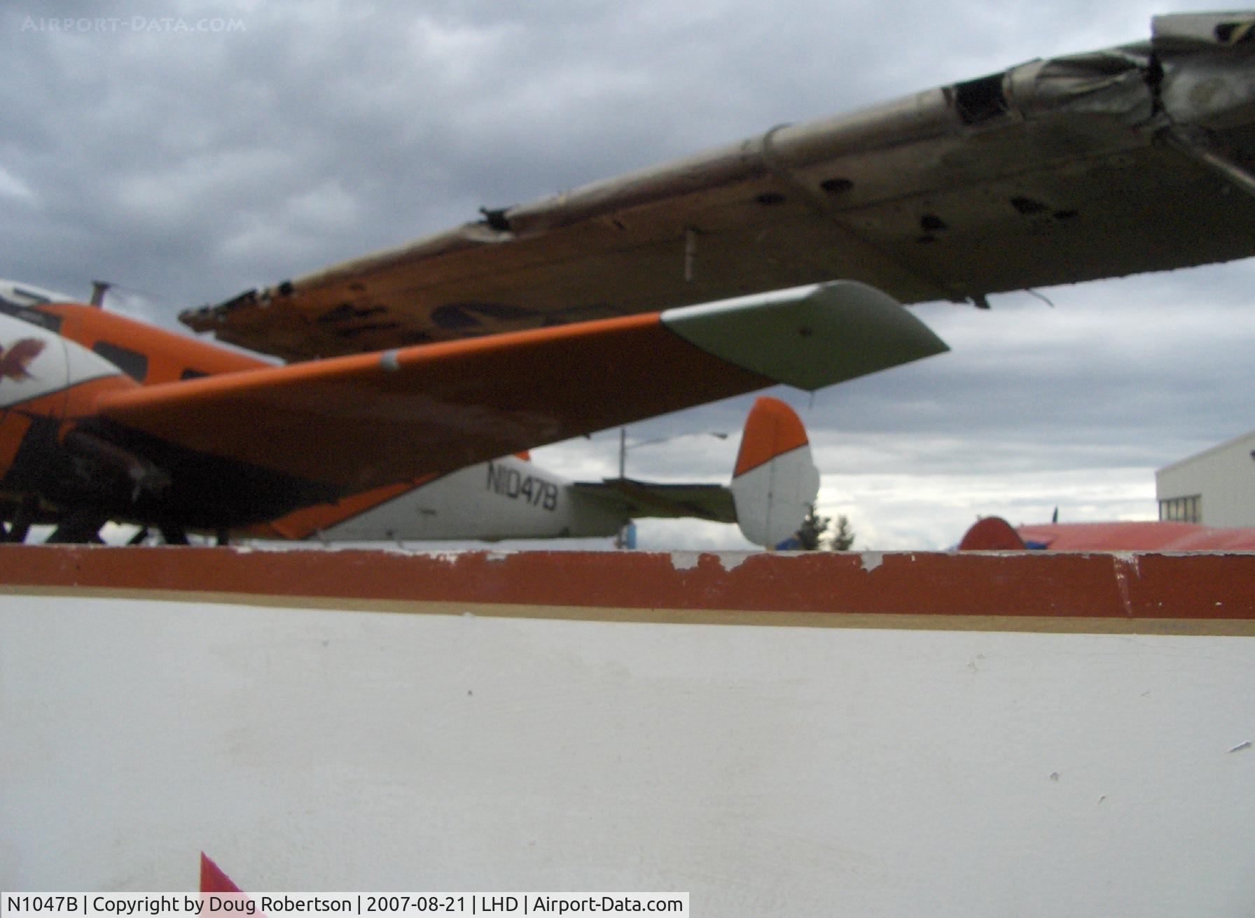 N1047B, Beech C18S C/N 7728, Beech C18S/UC-45F, two P&W R-985 450 Hp each, at Alaska Aviation Heritage Museum, difficult access this side