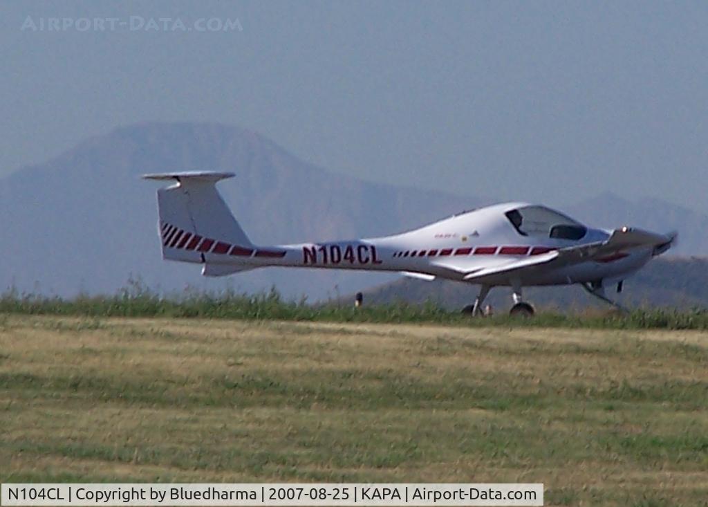 N104CL, 1998 Diamond DA-20C-1 Eclipse C/N C0004, Taxi to runway, with Pikes Peak in the background.