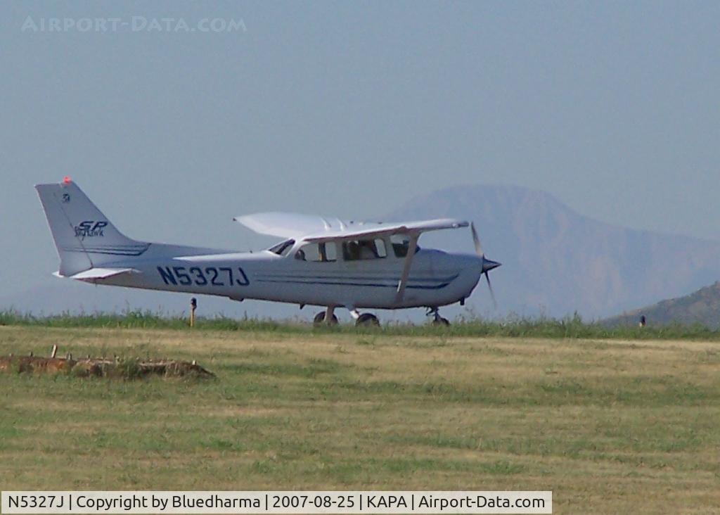 N5327J, 2003 Cessna 172S C/N 172S9356, Prep for takeoff, Pikes Peak in the background.