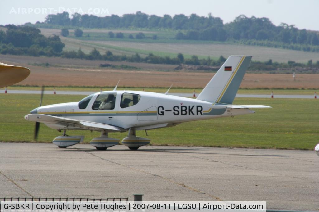 G-SBKR, 1990 Socata TB-10 Tobago C/N 1077, taxiing for departure from Duxford