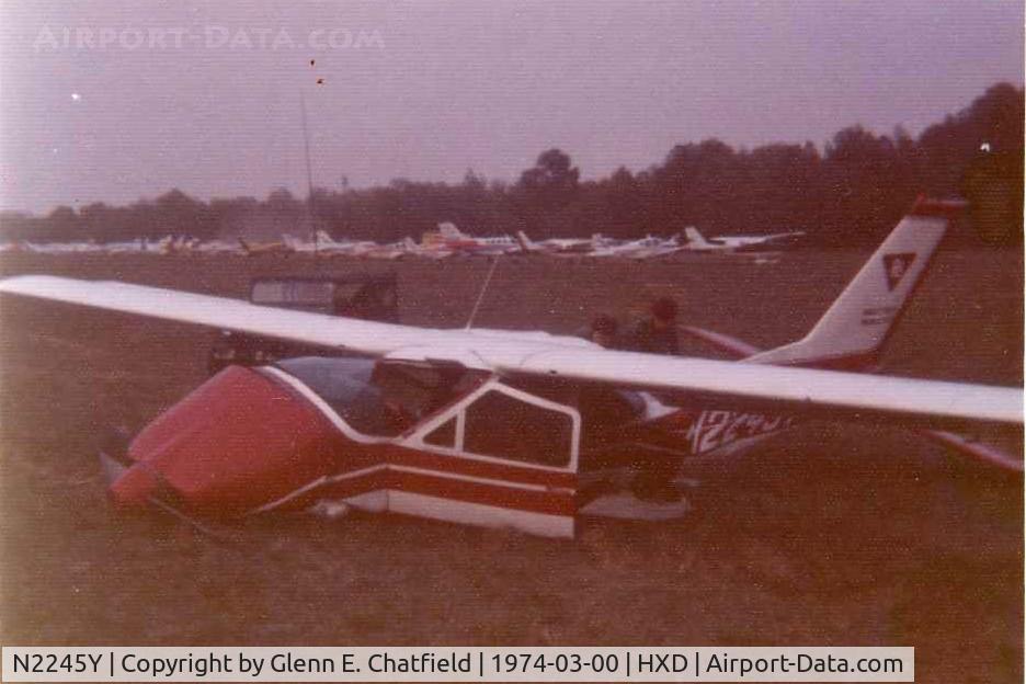 N2245Y, Cessna C177 C/N unknown, Pilot stalled on take-off with 30kt crosswind.  Minor injuries.  Late evening, I just landed in a CH-47 Chinook for building a pontoon bridge to the Island since a barge knocked out the only bridge.  The Jeep and two troopers were on the CH-47.
