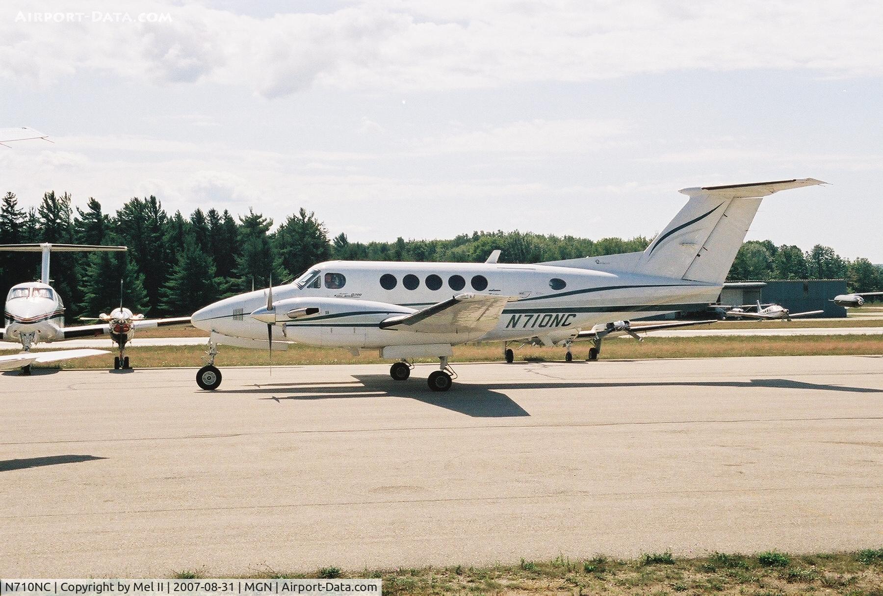N710NC, 1977 Beech 200 C/N BB-322, Taxi from landing RWY 28 @ Harbor Springs Airport (MGN)