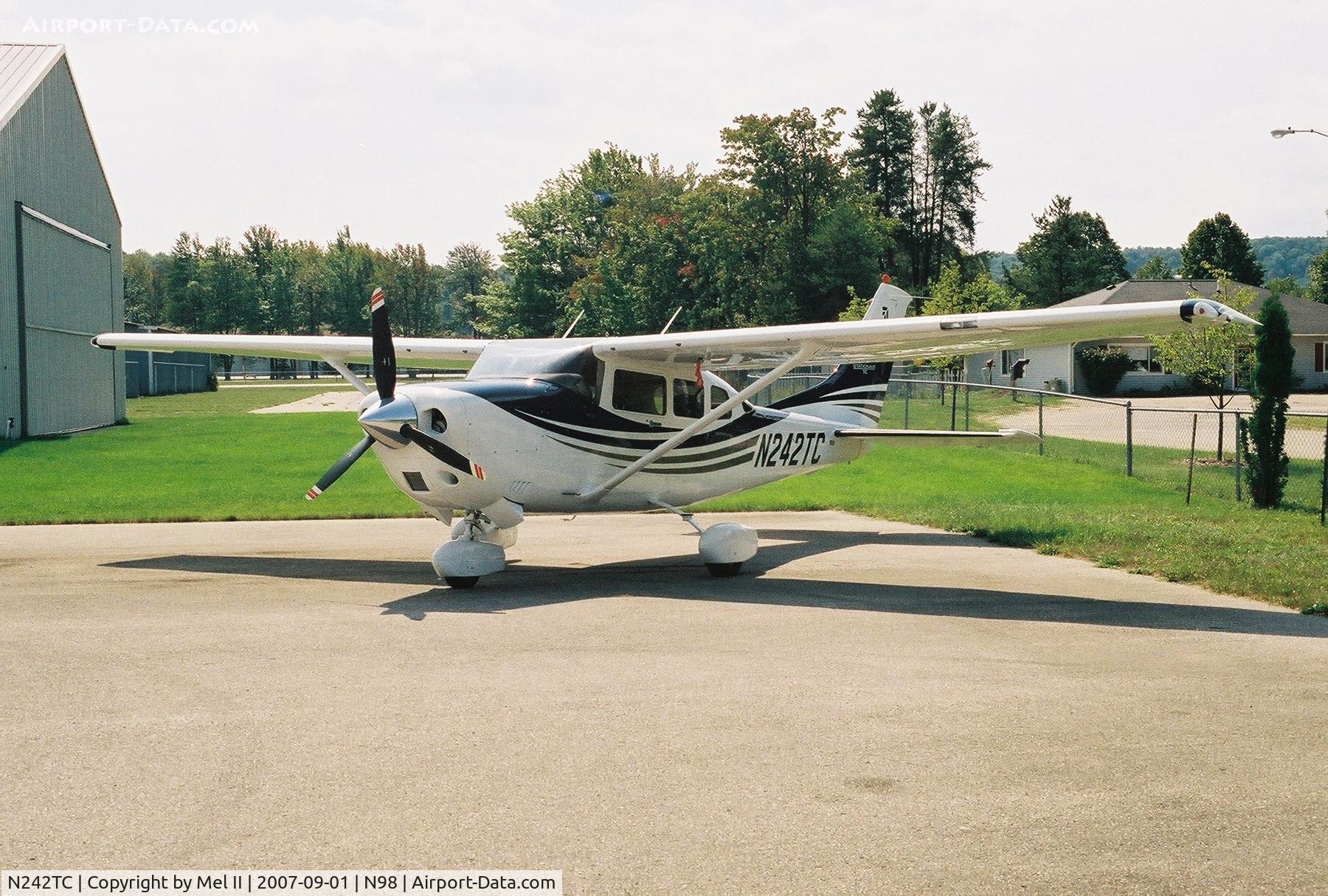 N242TC, 2005 Cessna T206H Turbo Stationair C/N T20608530, Parked @ Boyne City Municipal Airport (N98)