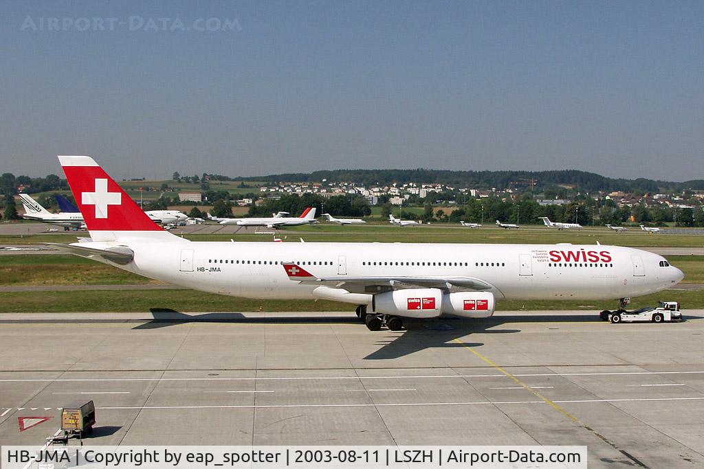HB-JMA, 2003 Airbus A340-313 C/N 538, she is towed to the gate