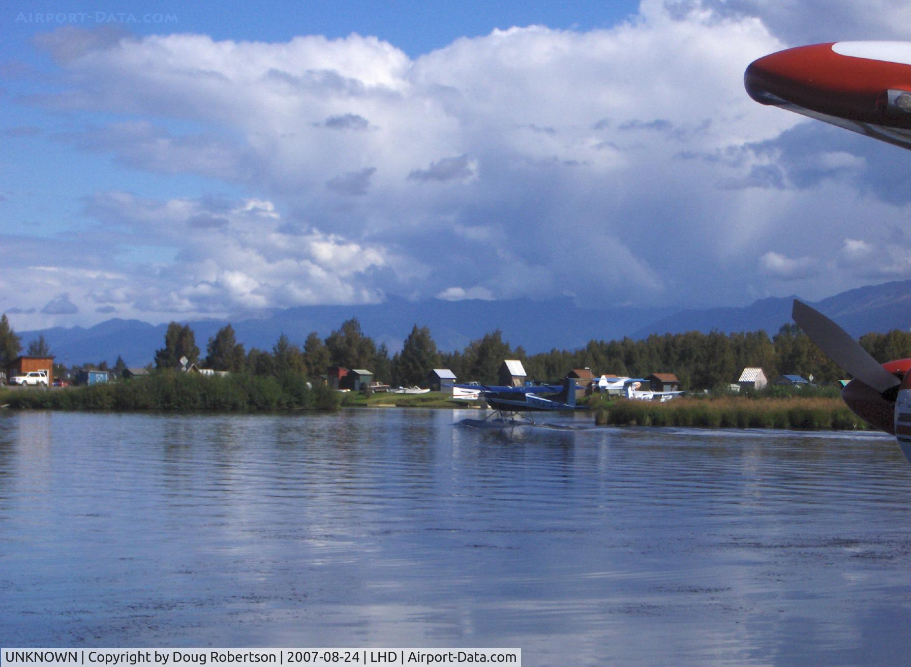 UNKNOWN, , Cessna, lake taxi after landing