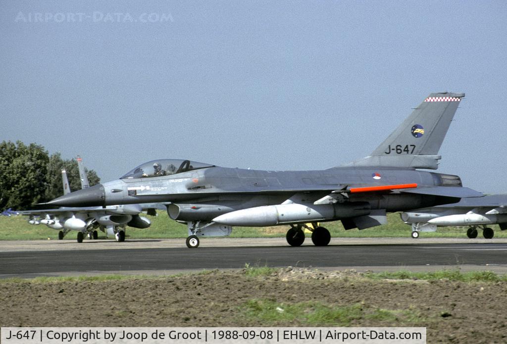 J-647, Fokker F-16A Fighting Falcon C/N 6D-79, 306 Sqn F-16 prepares for take off. In the background are exaples of 312 and 313 Sqn.