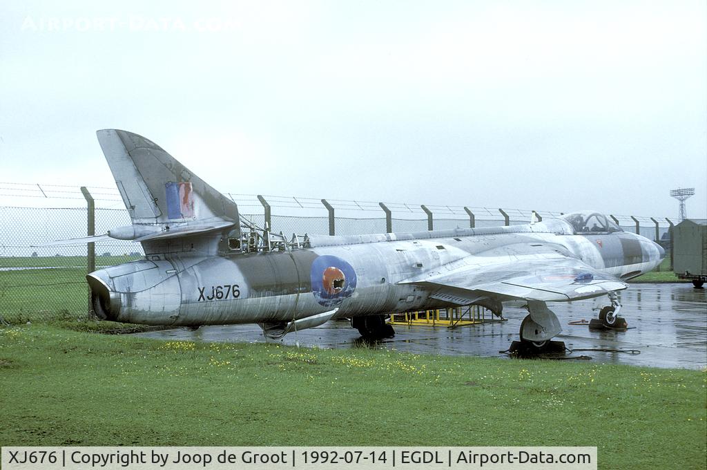 XJ676, 1957 Hawker Hunter F.6A C/N 41H-688067, This Hunter was amidst the C-130s at Lyneham. I guess this air frame has been scrapped by now.