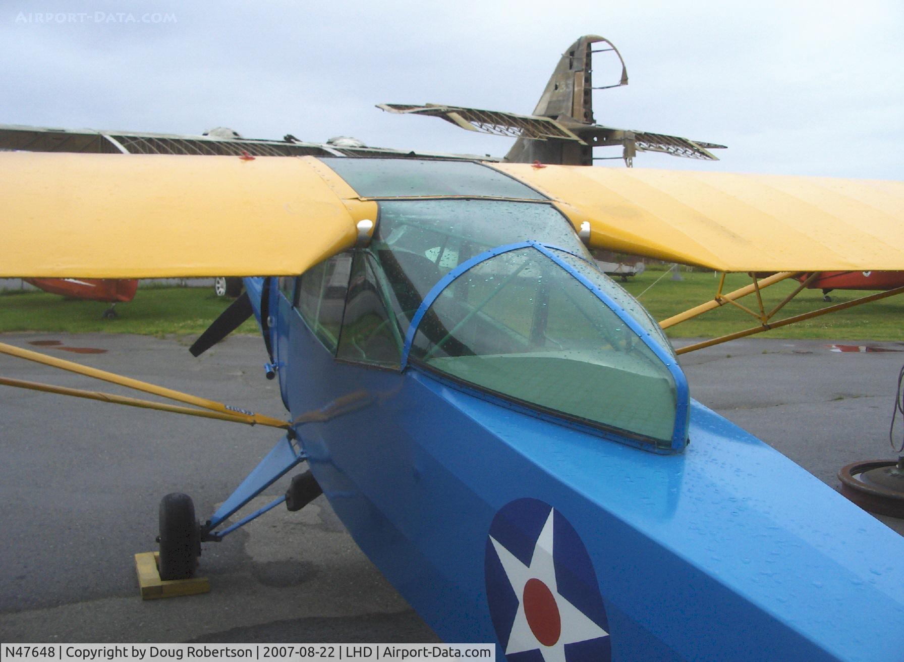 N47648, 1943 Taylorcraft DCO-65 C/N 5416, 1943 Taylorcraft DCO as L-2A-TA GRASSHOPPER liaison, Continental A&C65 65 Hp, tandem seating, cabin mod for visibility and wing trailing edge cut away near wing root, at Alaska Aviation Heritage Museum