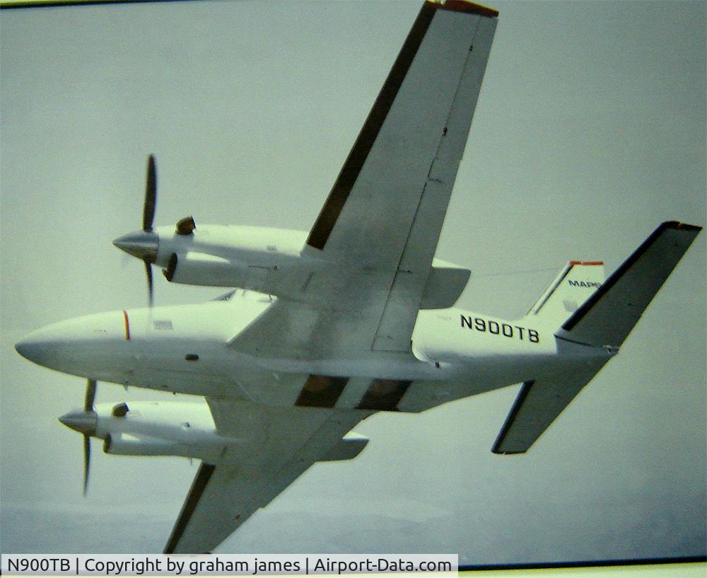 N900TB, 1974 Piper PA-31P Navajo C/N 31P-7400227, showing camera apertures