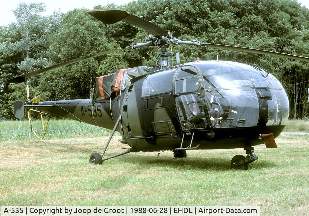 A-535, Sud SE-1360 Alouette III C/N 1535, On this damp day all based Alouette III were parked on the grass near the taxiway. A good oportunity to see many of these helicopters.