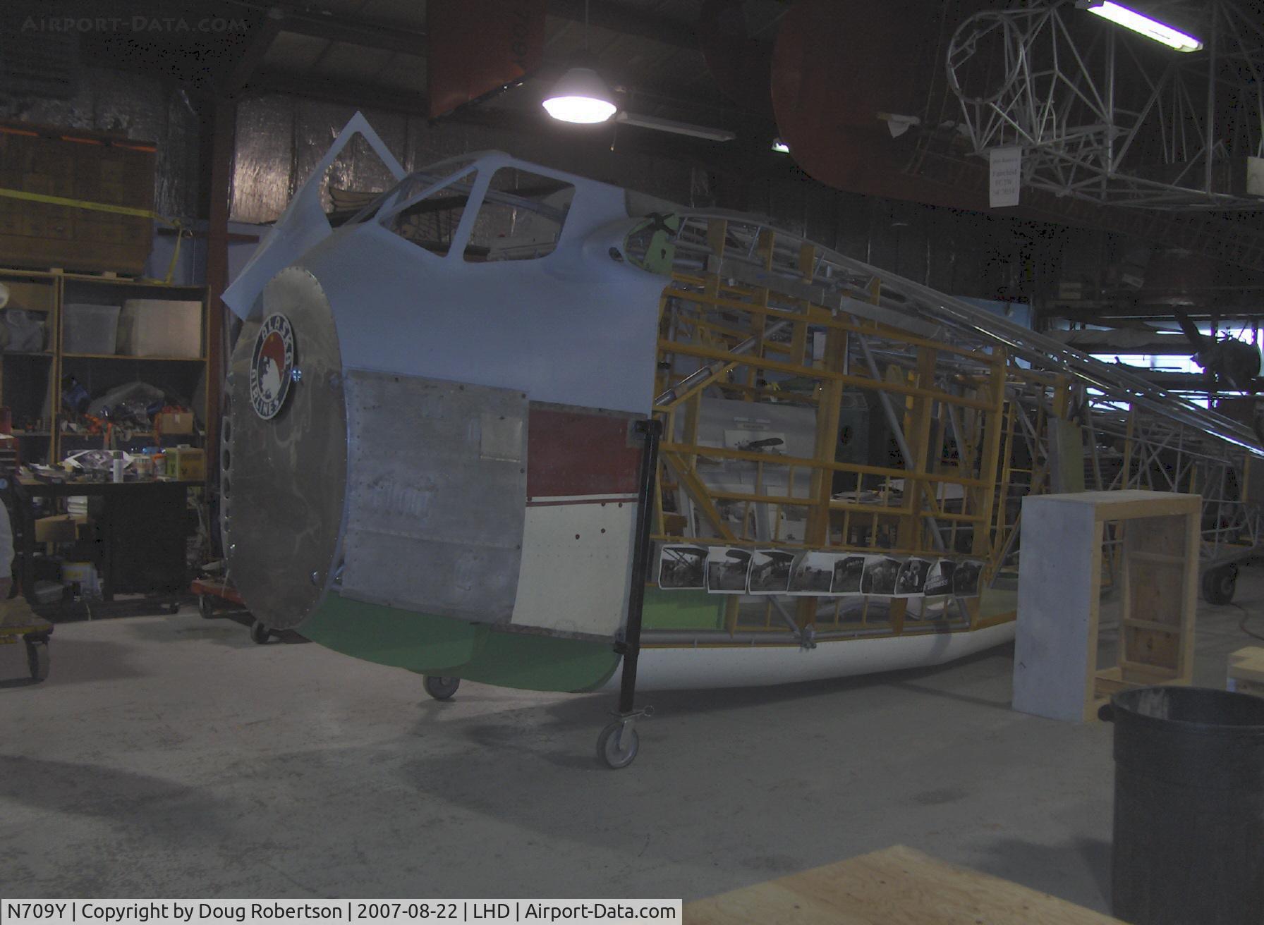 N709Y, 1931 American Airplane & Engine Pilgrim 100B C/N 6605, 1931 American Airplane & Engine PILGRIM 100-B, P&W R-1340 600 Hp, under complete reconstruction/restoration, at Alaska Aviation Heritage Museum, windshield framing area behind/above engine firewall-forward fuselage