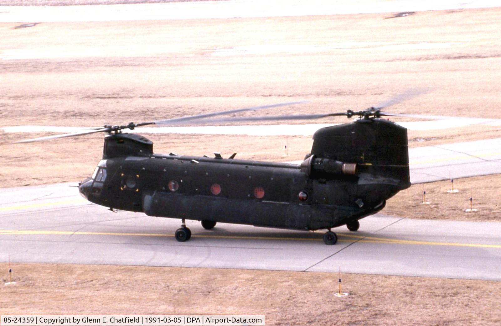 85-24359, 1985 Boeing CH-47D Chinook C/N M.3129, CH-47D taxiing by the control tower