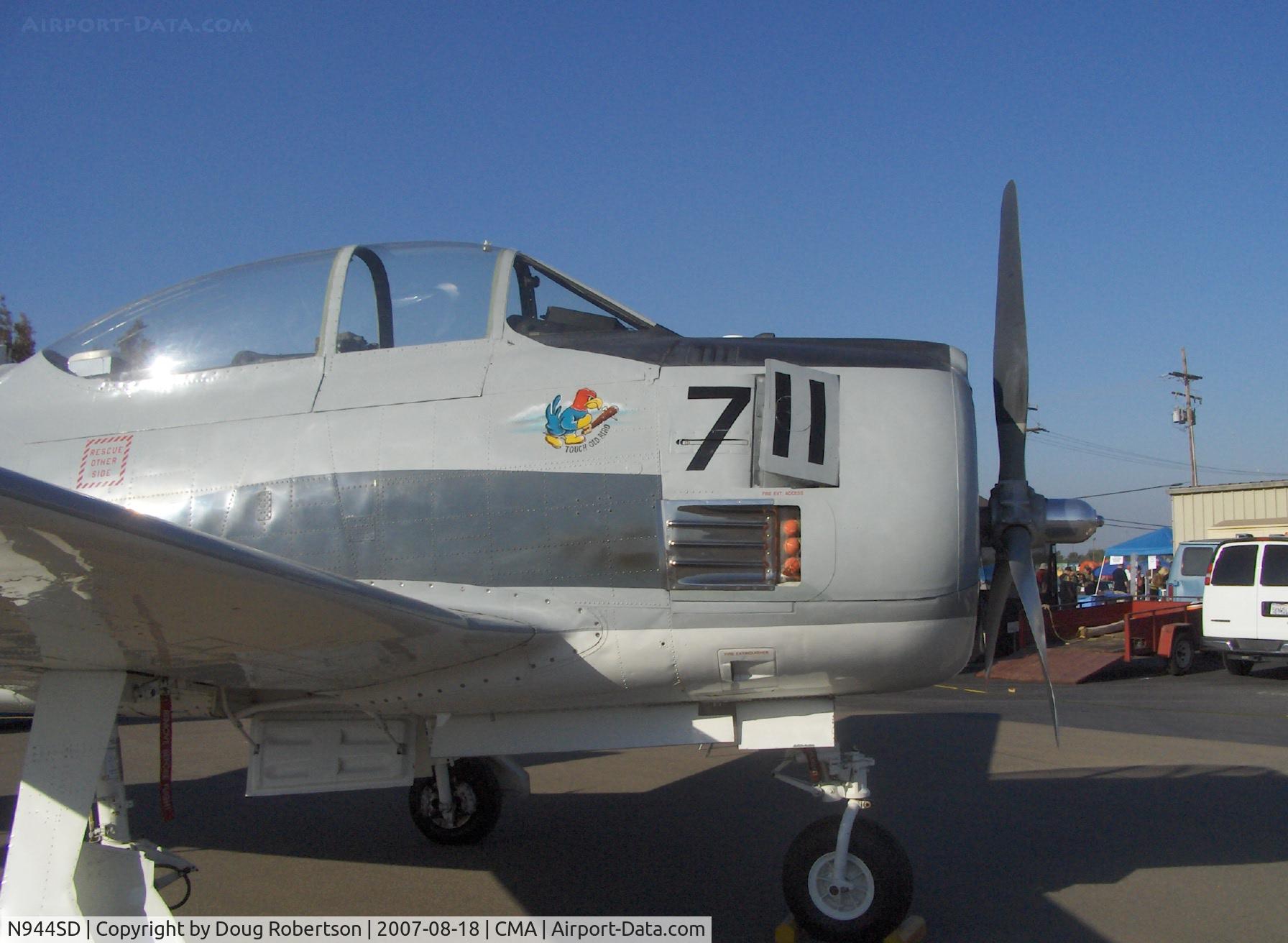 N944SD, 1954 North American T-28C Trojan Trojan C/N 226-108, 1954 North American T-28C TROJAN 'Tough Old Bird', Wright R-1820 Cyclone 1,425 Hp, logo