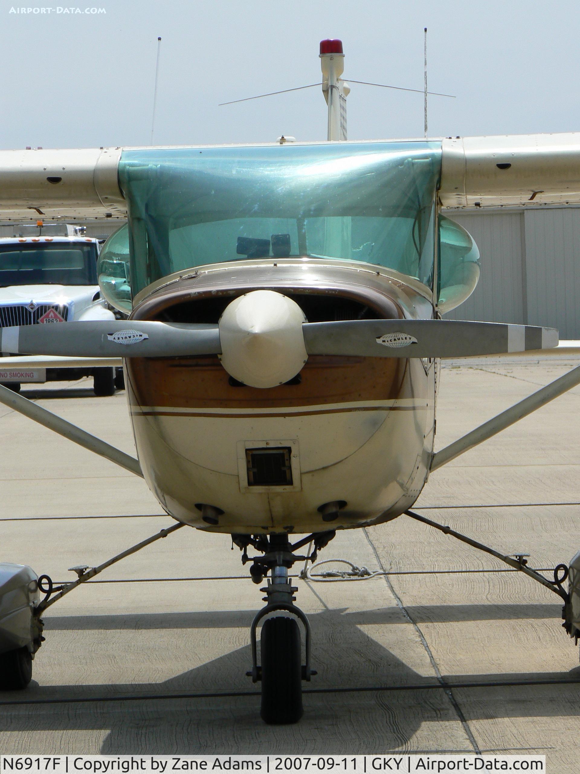 N6917F, 1966 Cessna 150F C/N 15063517, on the ramp at Arlington Muni - w/ observation windows installed