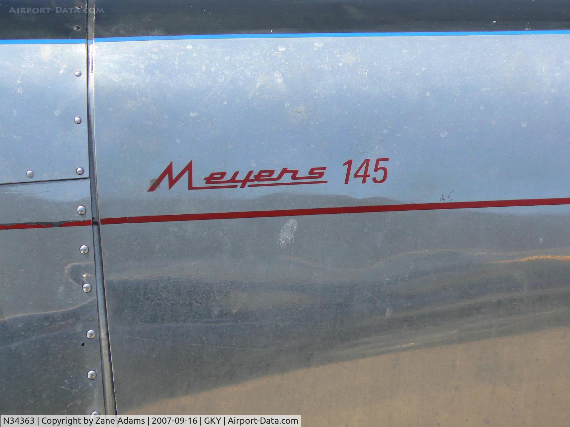 N34363, Meyers MAC-145 C/N 206, on the ramp at Arlington Muni  Closeup on cowl