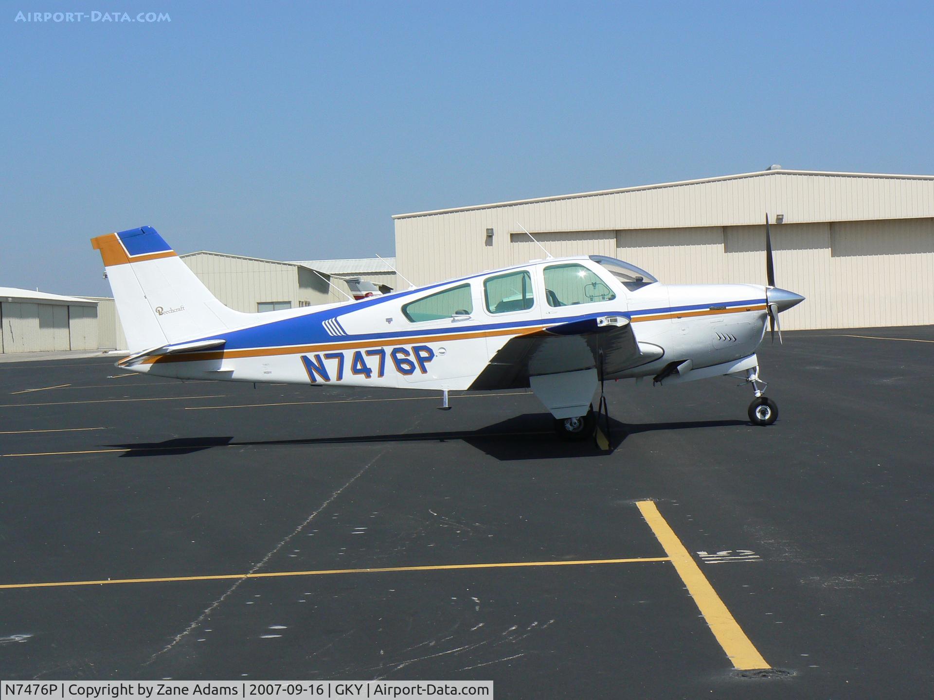 N7476P, 1976 Beech F33A Bonanza C/N CE-631, on the ramp at Arlington Muni